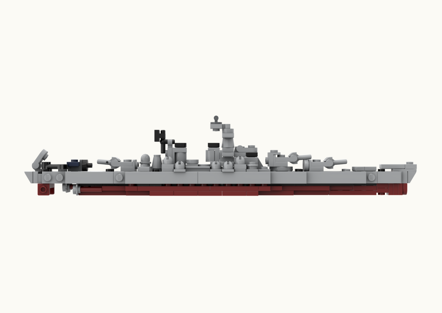Model of a ship made from interlocking bricks on a white background