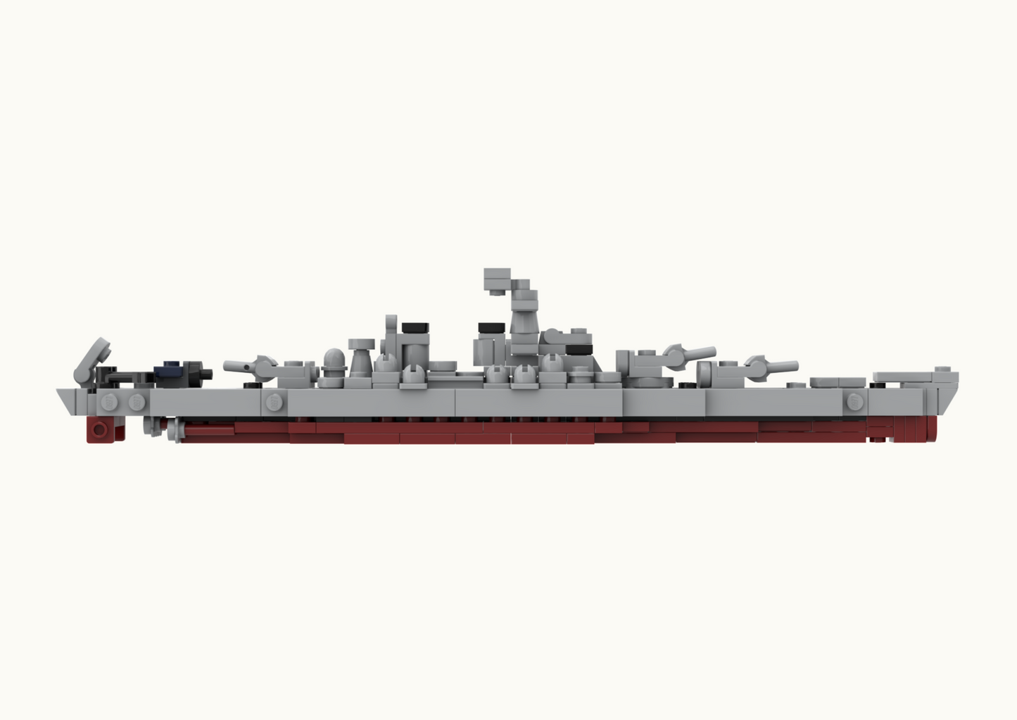 Model of a battleship made from interlocking bricks on a white background