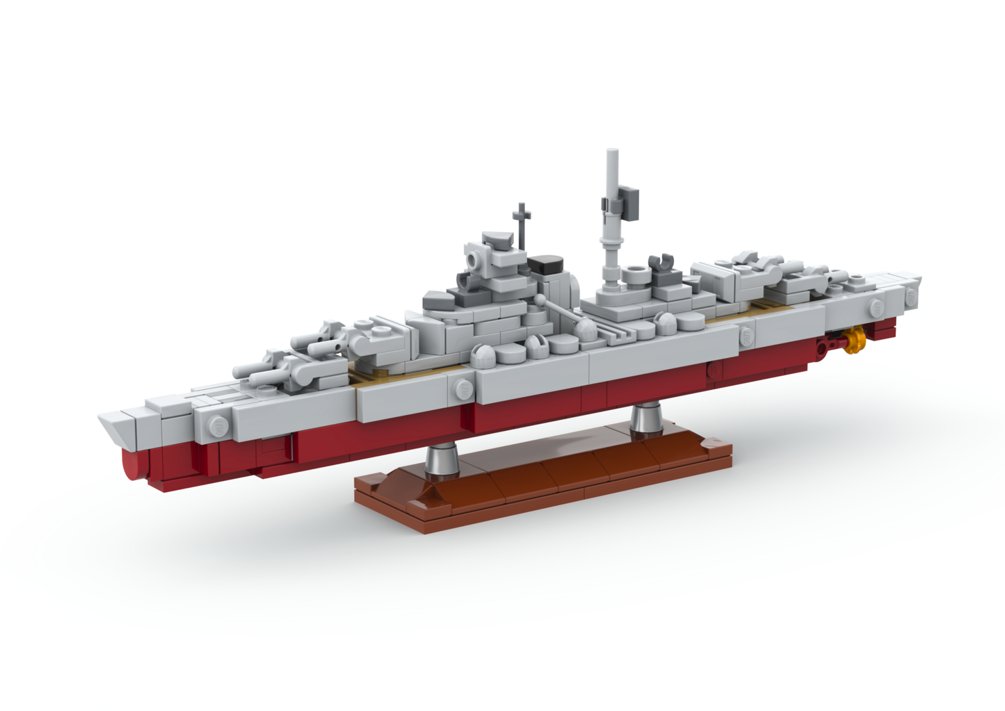 Model of a battleship made from building blocks on a white background