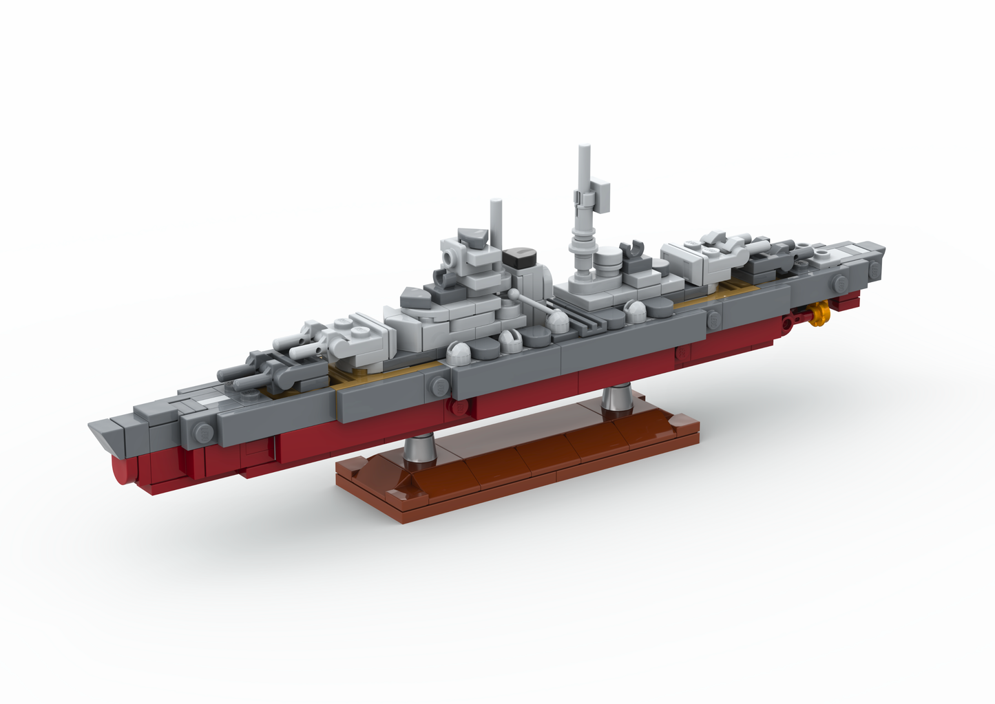 Model of a battleship made from interlocking bricks on a white background