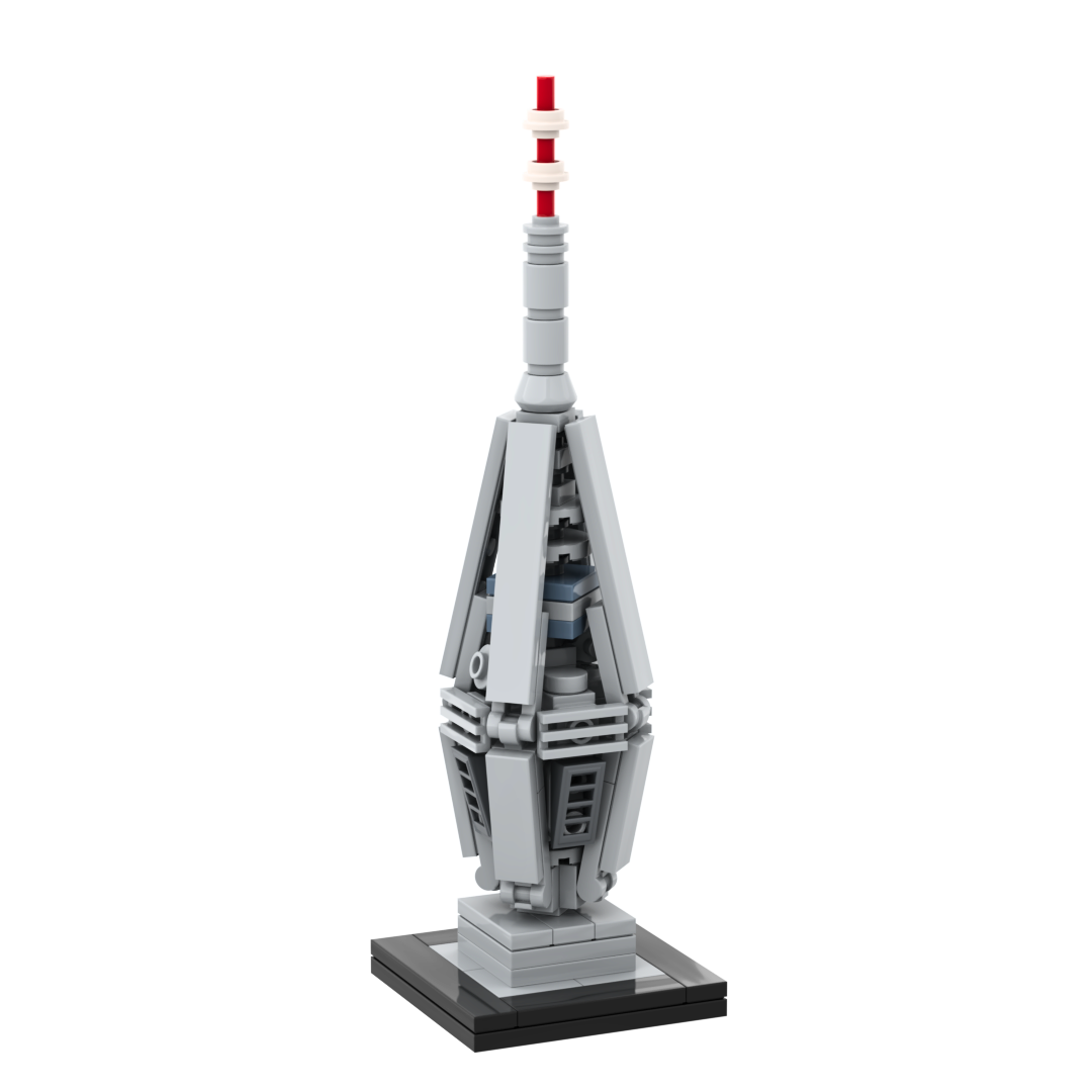 Model of a tower made from building blocks on a white background