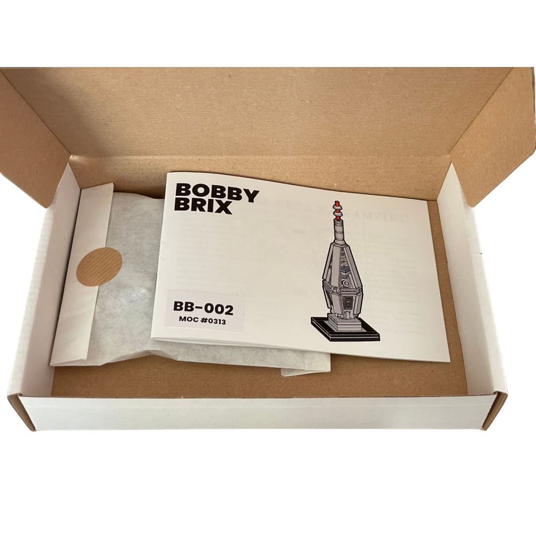 Open box containing a model kit with 'Bobby Brix' branding and product details.