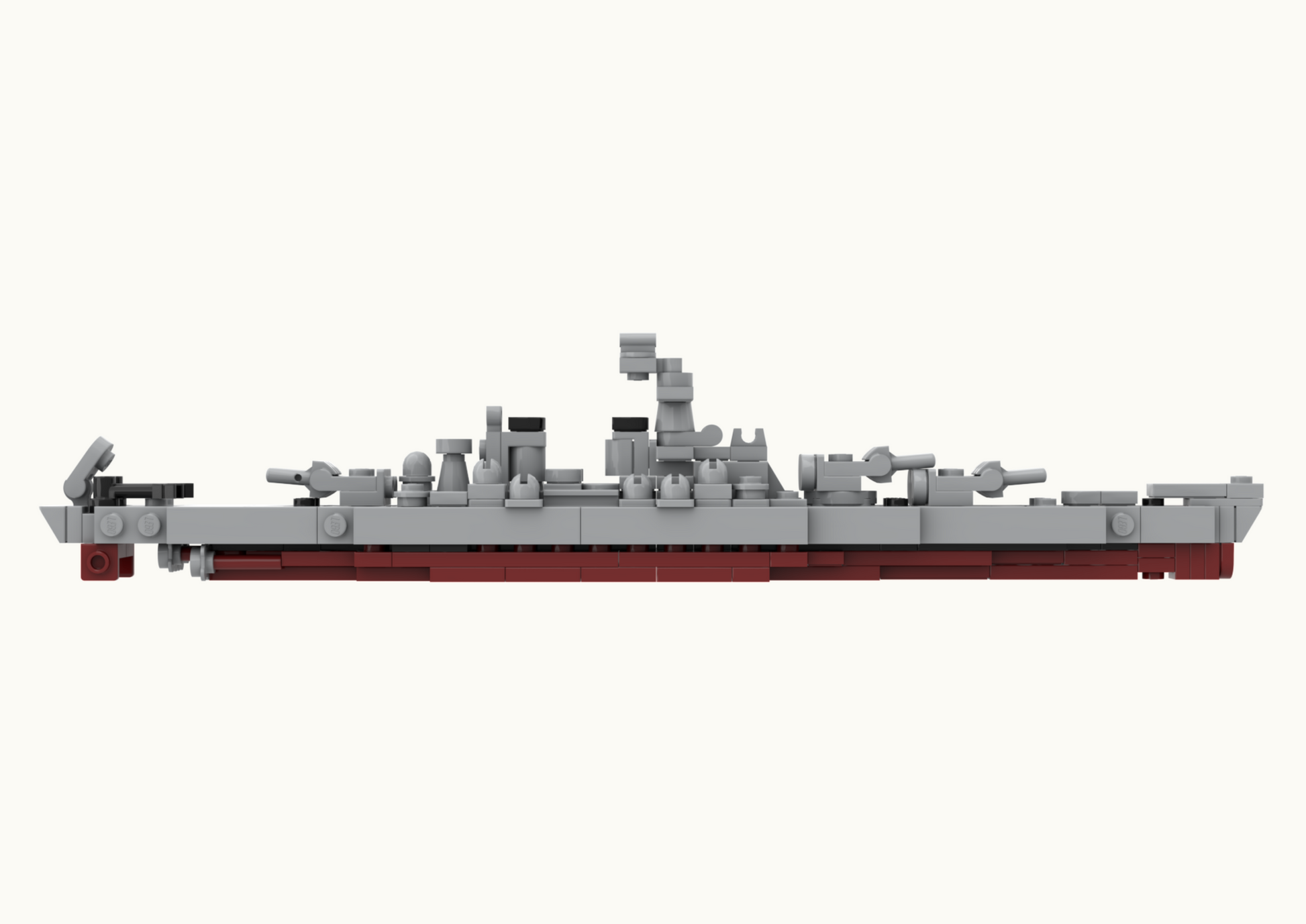 Model of a battleship made from interlocking plastic bricks on a white background
