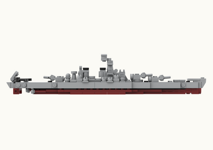 Model of a battleship made from interlocking plastic bricks on a white background