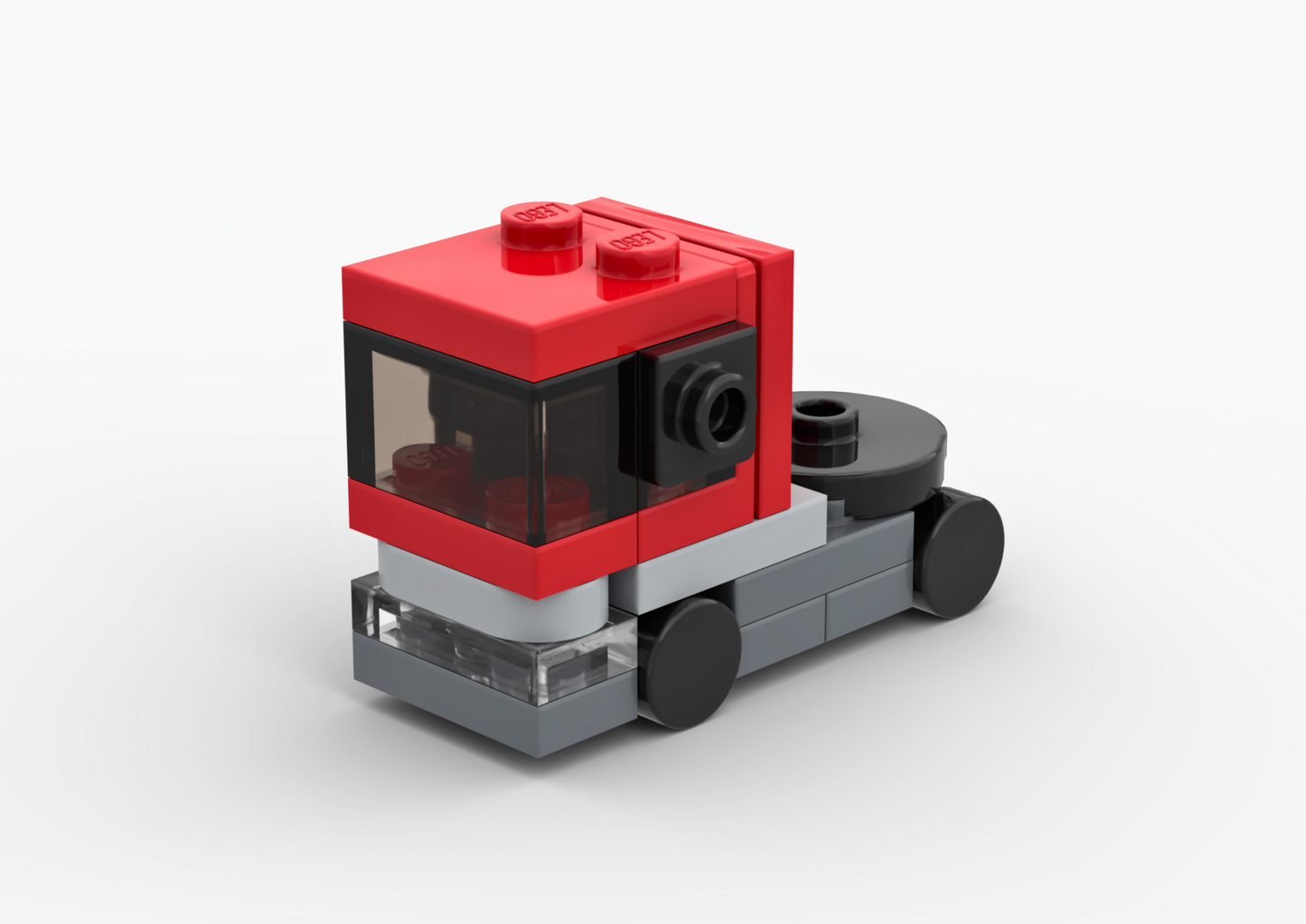 Small model of a vehicle made from interlocking bricks on a white background