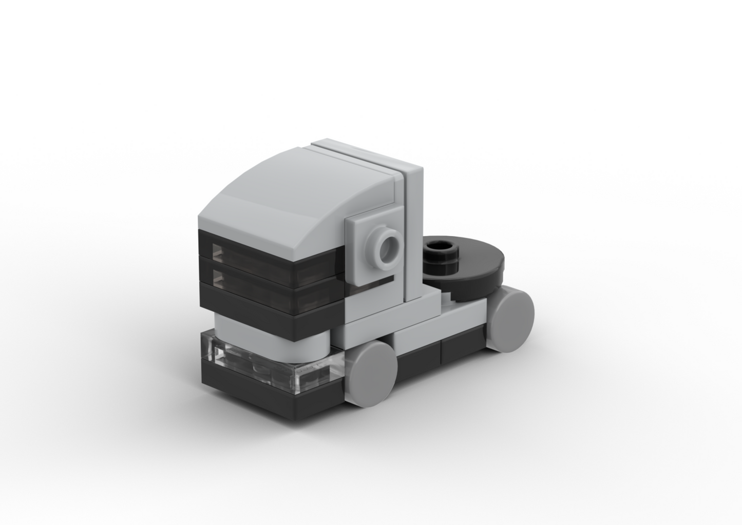 Small model of a truck made from interlocking bricks on a white background