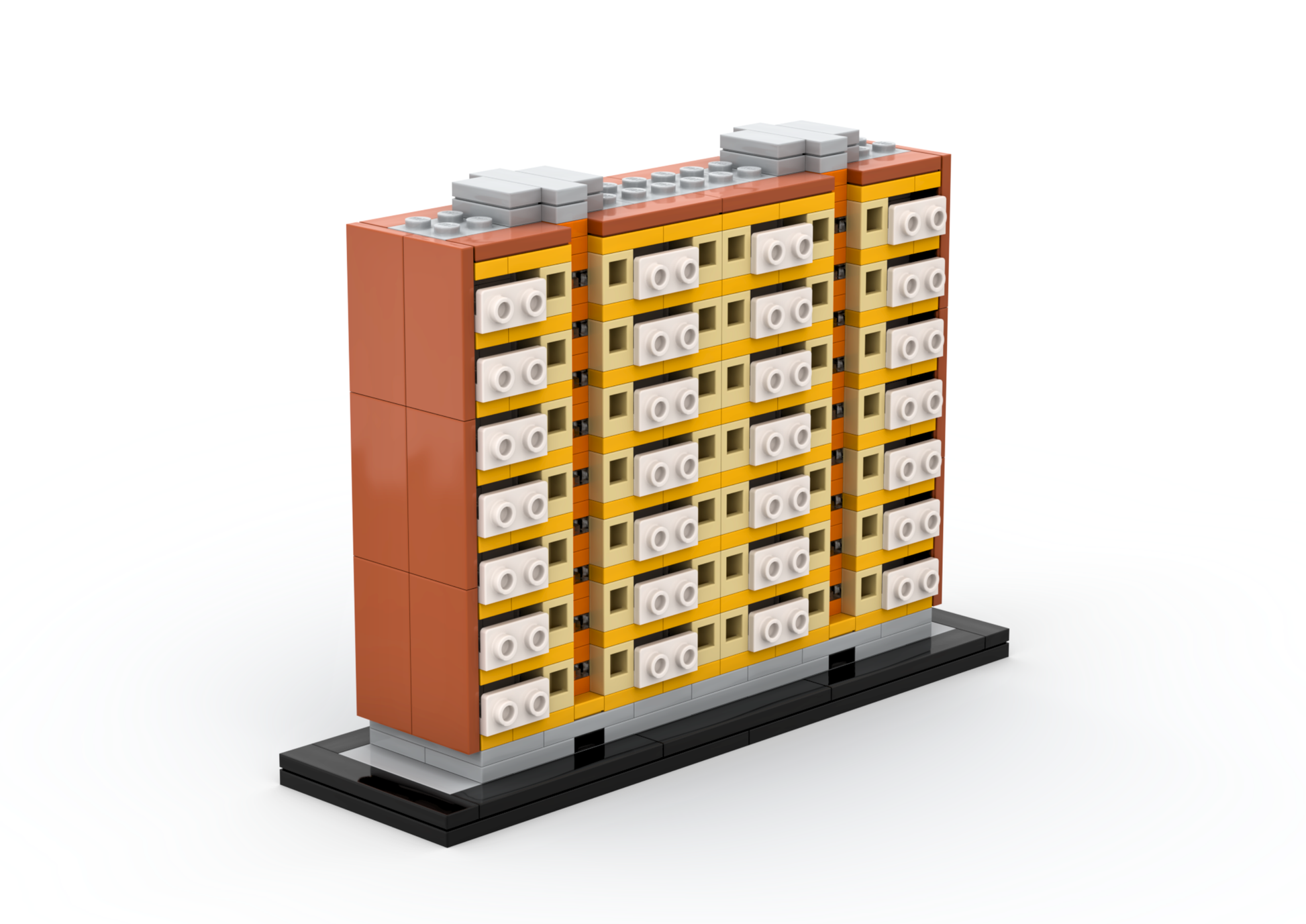 Model of a building made from interlocking bricks on a white background.