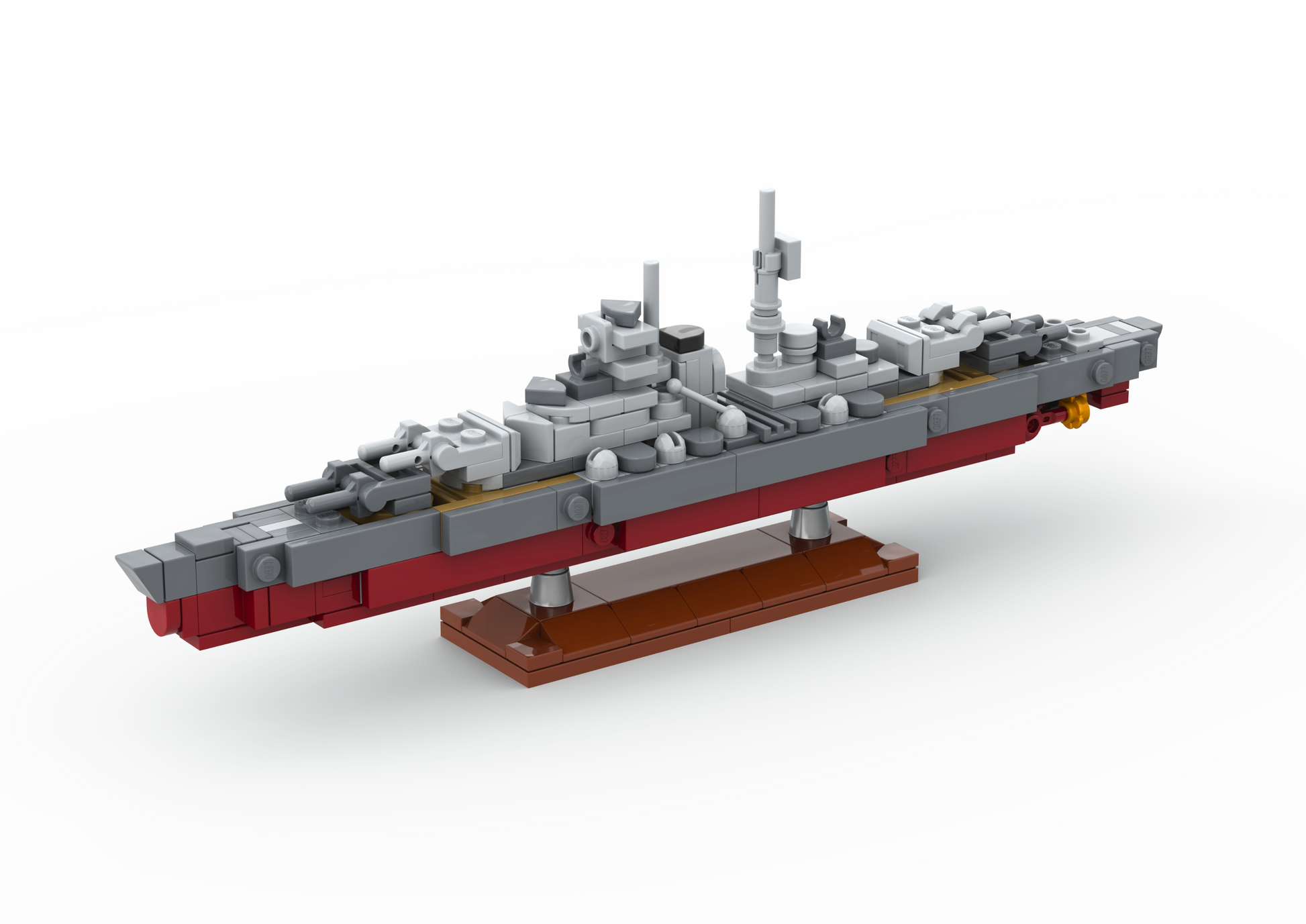 Model of a battleship made from interlocking bricks on a white background