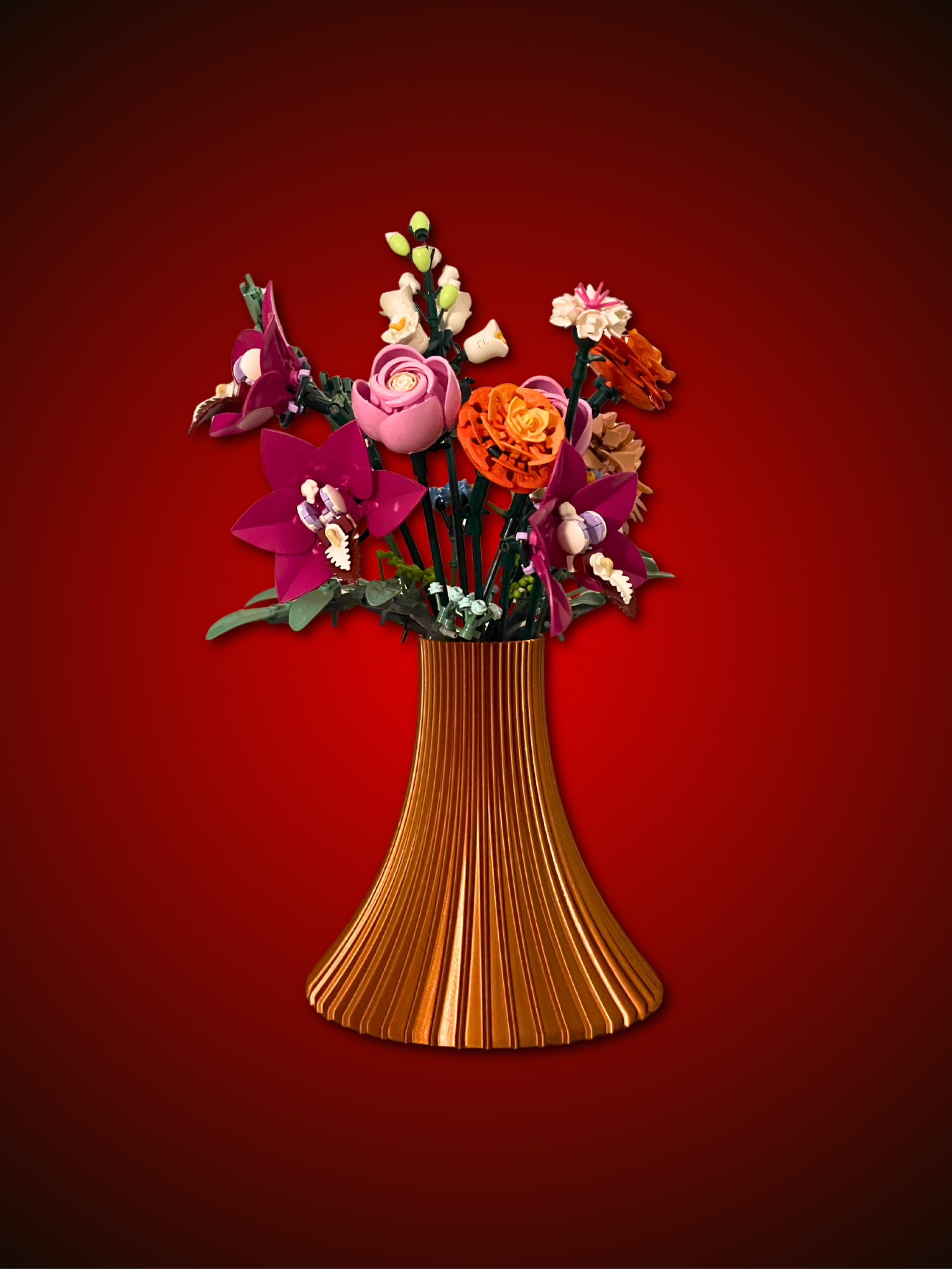 Decorative vase with colorful flowers on a red background